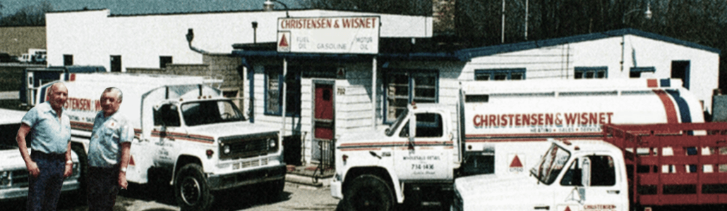 Pictured here is Earl Christensen and Joe Wisnet Sr. at our original office location at 702 S Outagamie St Appleton, WI. We moved in 2006 to 4450 W Greenville Drive. Also pictured is our Oil Trucks.